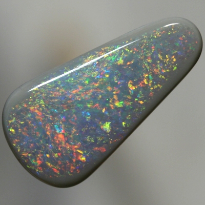 SOLID SEMI BLACK OPAL Sparkling red and orange over green and blue